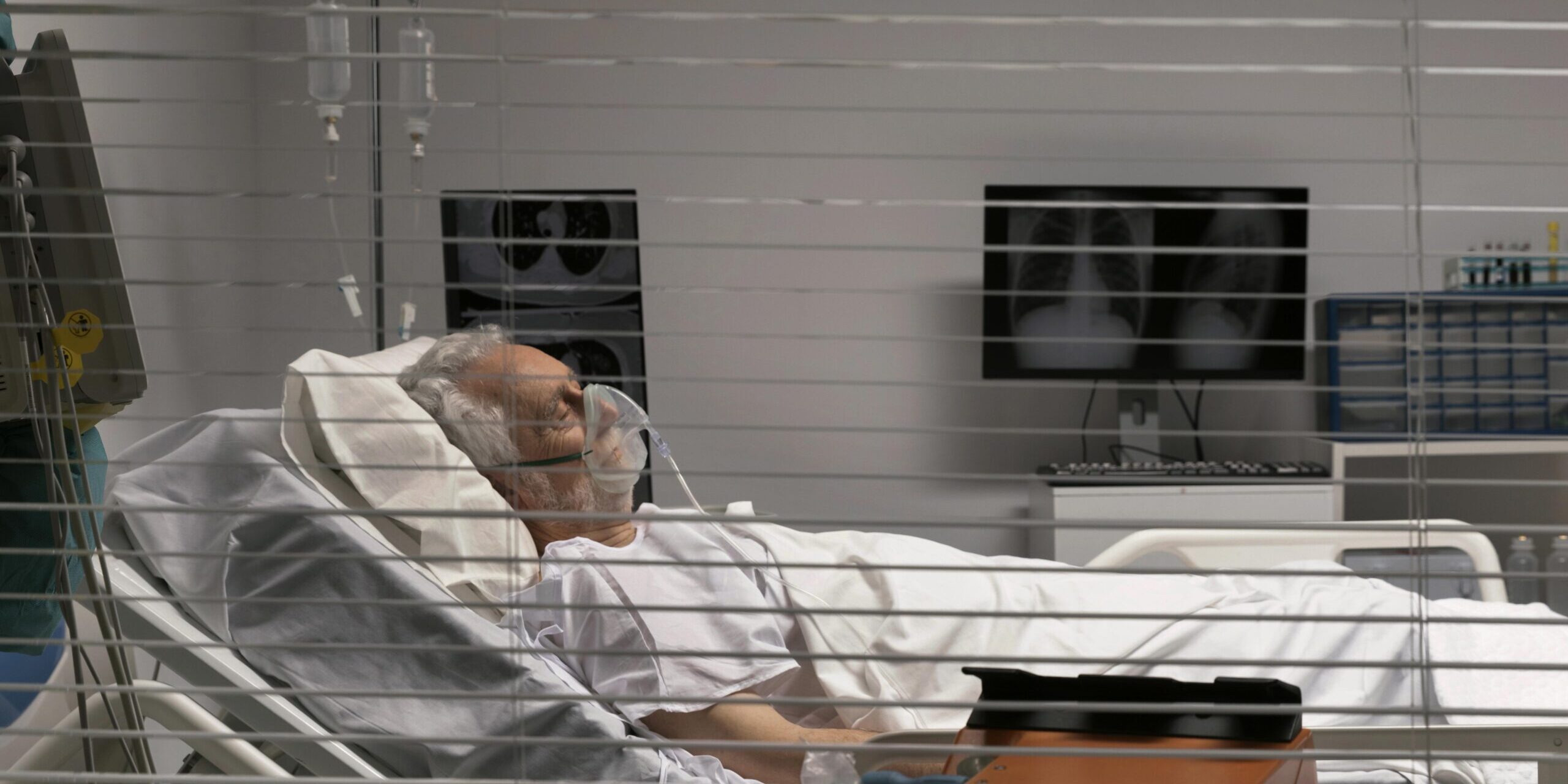 ill-senior-man-staying-bed